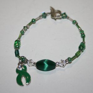 Beautiful silver and green awareness ribbon bracelet 8"